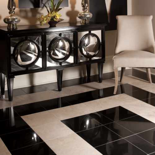 A black and white tile floor with a mirror