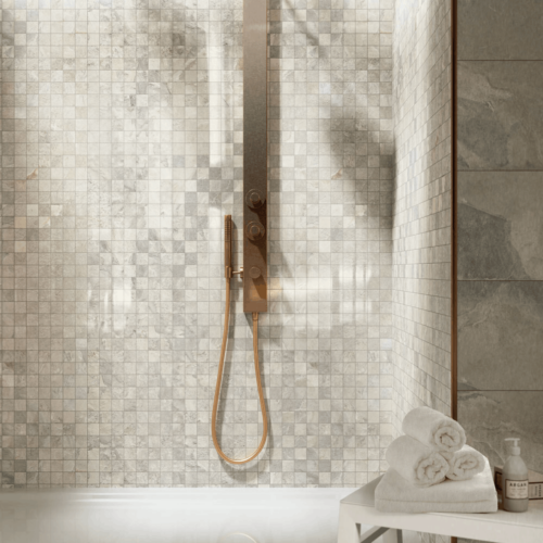 A shower with a wooden handle and white tiles